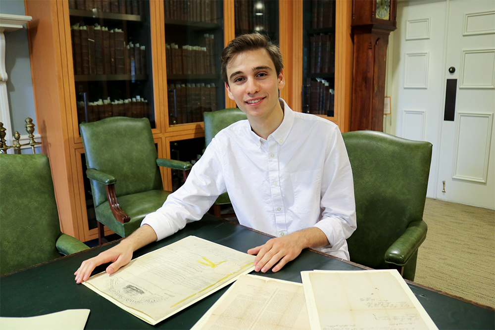 Sam Bisno in a library setting